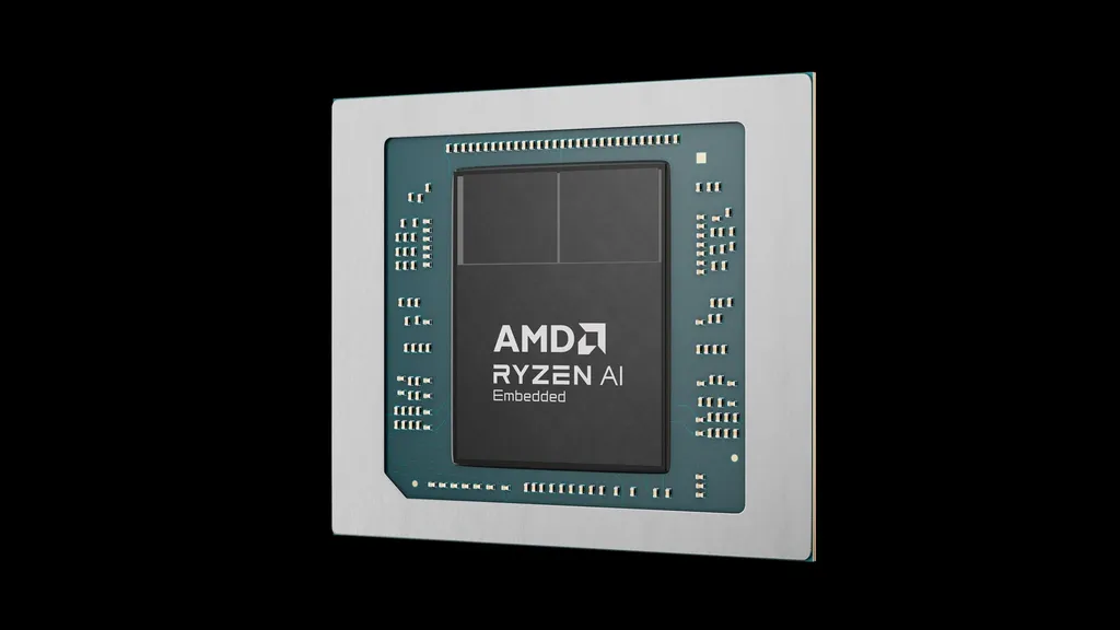 A rendered close-up of an AMD Ryzen AI Embedded processor package, showing the chip die stamped 'AMD RYZEN AI Embedded' at the center of a green substrate surrounded by surface-mount components, against a black background